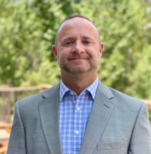 Headshot of Eric Bellas, owner of RSVP Colorado Springs
